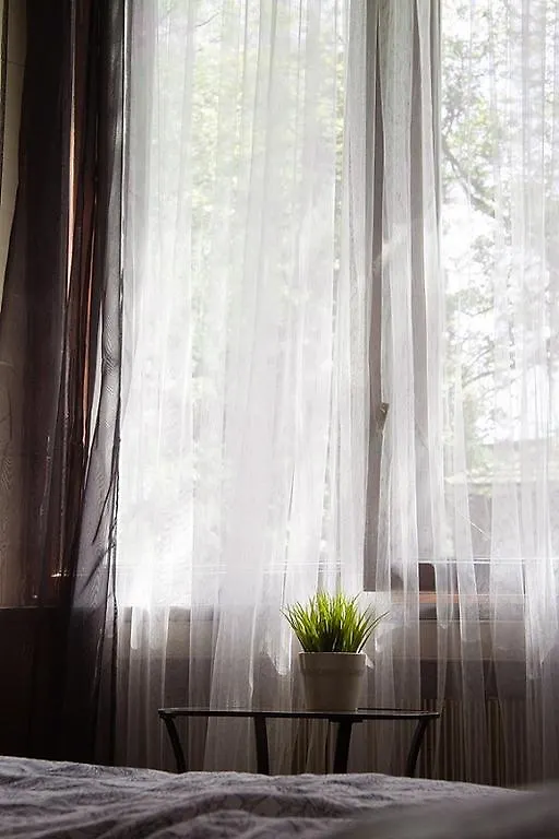4 Couples & 4 Friends Hostel Cracovie Couette-café